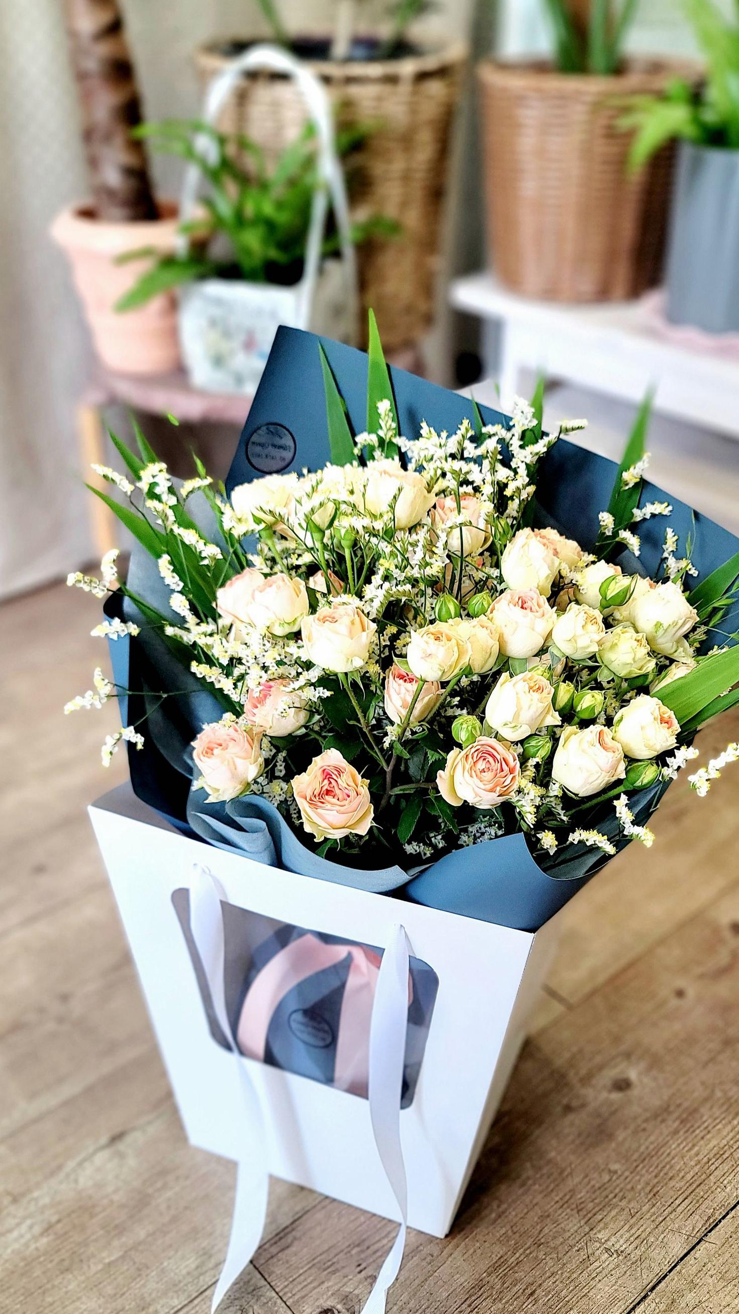 Peaceful white roses for sympathy